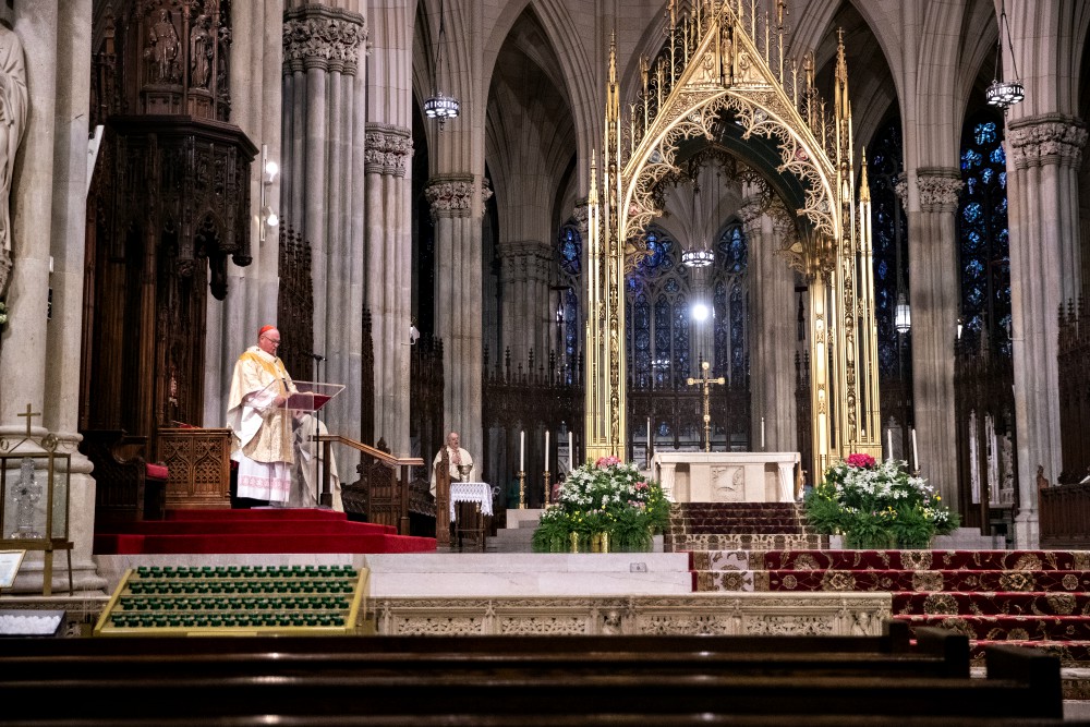 New York Cardinal Timothy Dolan celebrates Easter Mass at St. Patrick's Cathedral April 12 during the coronavirus pandemic. (CNS/Reuters/Jeenah Moon) New York Cardinal Timothy Dolan celebrates Easter Mass at St. Patrick's Cathedral April 12 during the coronavirus pandemic. (CNS/Reuters/Jeenah Moon)